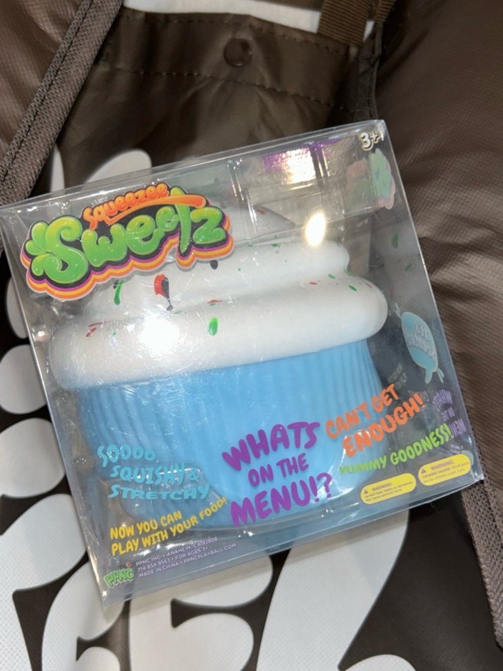 Squeeze Sweetz Blue Cupcake Squishy with White Frosting and Multicolor Sprinkles